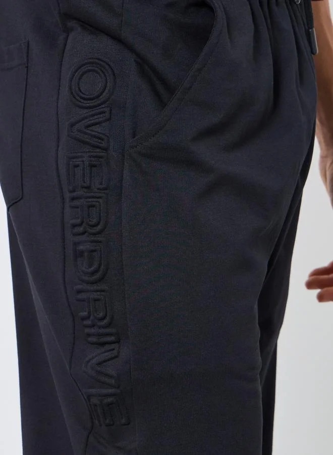 Styli  Men Black Oversized Side Embossed Joggers for Men | Best Price UAE